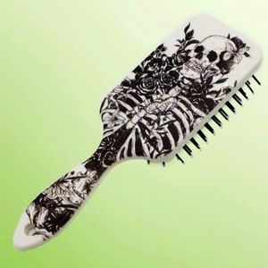 Skull designed hairbrush